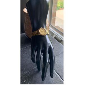 Timex Philippines Water Resistant Gold tone watch with Gold dial, Signed